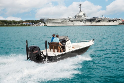 231XS running with naval ship in background